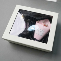 Boîte rigide blanche personnalisée avec fenêtre transparente pour l'arrangement floral, les parfums et l'emballage de cadeaux