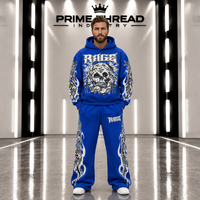 Ensemble de survêtement personnalisé pour homme avec motif tête de mort, sweat à capuche oversize et pantalon de survêtement ample à jambes larges, style streetwear, deux pièces