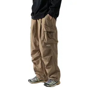 कस्टम थोक आउटडोर पैराशूट पैंट स्प्रिंग पॉकेट कार्गो पैंट पुरुषों स्वेटपैंट