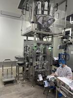 Machine d'emballage verticale pour sachets de café à quatre soudures avec valve de dégazage