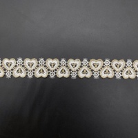 Tissu en dentelle brodée 100% polyester et accessoires avec des lignes dorées tendance et des motifs en dentelle