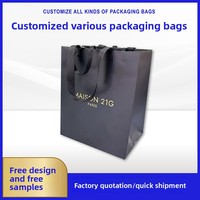 Sac cadeau en papier noir de luxe avec logo personnalisé, estampage à chaud doré, sac d'emballage pour boutique de bijoux avec poignée en ruban