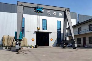 Grue <span class=keywords><strong>portique</strong></span> à double poutre sur pneus en caoutchouc de 16 tonnes multi-usages pour le chargement en entrepôt - Product Image 6