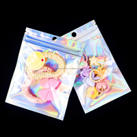 Sac mini-zippé holographique transparent avec fermeture éclair pour l'emballage de bijoux et les solutions de marquage personnalisé