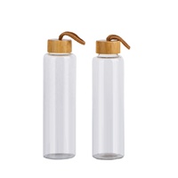Bouteille d'eau en verre de 600ml avec couvercle en acier inoxydable ou couvercle en bambou Bouteille de jus de boisson