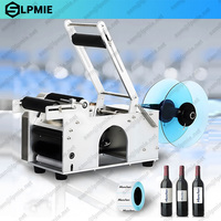 LPMIE Étiqueteuse manuelle portable Applicateur semi-automatique d'étiquettes à surface plane pour boîtes en carton/bouteilles carrées/boîtes de conserve