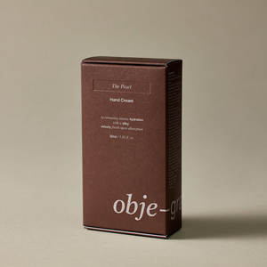 Objegrance Pearl Hand Cream Ligero No pegajoso Acabado en polvo Humedad larga Boquilla estrecha Clima caliente - Product Image 1