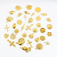 Vente en gros de breloques personnalisées pour la fabrication de bijoux pendentif à breloque en forme d'étoile de mer et de conque en acier inoxydable doré