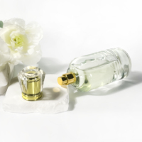 Bouteille de parfum en verre transparent de 100ml vide clair nouveau design atomiseur de pompe de pulvérisation pour l'emballage de soins de la peau bouteille de parfum de luxe