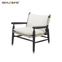 Fauteuil de détente minimaliste haut de gamme en rotin tressé, bois de frêne noir minuit, tissu écologique, pour villa de luxe, salon et chambre