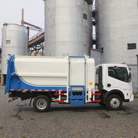 Fonctionnalité d'auto-déchargement de camion à ordures diesel manuel 4x2 personnalisable pour le service d'OEM de moteur de pompe à moteur de noyau de gestion des déchets