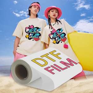 Rollo de película de transferencia de brillo PET DTF de fábrica 30cm/60cm * 100M película de rollo de transferencia de calor para impresión DTF - Product Image 1