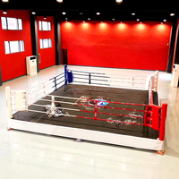 Anneaux de boxe neufs ou d'occasion avec anneaux de boxe à plancher bas Toile de ring de boxe personnalisable pour train
