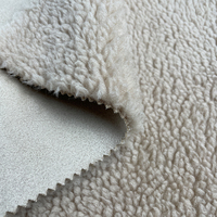 Tissu en fausse fourrure de peau de mouton Tissu en fausse fourrure collée en daim pour vêtements d'hiver Veste Manteau