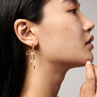 Boucles d'oreilles J&D New Trend Luxury pour femmes, plaquées or 18 carats, en acier inoxydable, avec zircon, en forme de nœud, pour filles