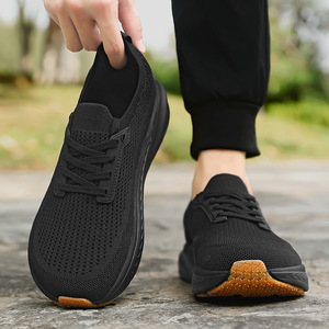Zapatillas de deporte transpirables de punto para hombre, ligeras, con cordones, antideslizantes, suela gruesa, calzado deportivo informal diario - Product Image 1