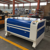 Machine de gravure laser CO2 ActionLasers 1080 DR automatique haute précision avec refroidissement par eau pour le bois, l'acrylique, le papier et la conception