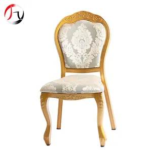 Cadeiras de luxo empilháveis, cadeiras de estofos sala de jantar imitadas em ouro real, banquete de casamento de madeira