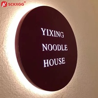 Enseigne circulaire rétroéclairée en métal brossé avec logo personnalisé à LED chaude pour la décoration de salons, spas et magasins
