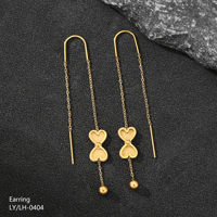 Anting-anting wanita mewah bergaya vintage berkualitas tinggi berlapis emas 18k dari baja tahan karat dengan desain bunga berdaun empat dan kupu-kupu serta rumbai panjang.