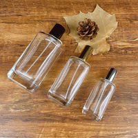 Venta al por mayor directa de fábrica: Botella de vidrio ámbar mate cuadrada de 30ml/50ml/100ml para aceite de perfume con boquilla personalizada serigrafiada