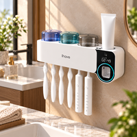 Stérilisateur UV intelligent pour brosses à dents, nouveau support mural sans perçage, ensemble de lavage, porte-brosse à dents en plastique avec distributeur de dentifrice électrique