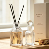 Bouteille en verre côtelée verticale pour diffuseur de parfum, 30/50/100 ml, avec bouchon boule en verre, logo personnalisé, vente en gros usine