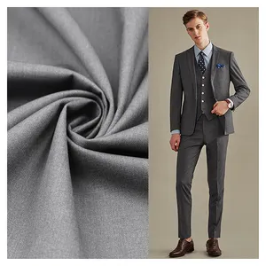 Toptan fiyat dimi kalınlaşmış üniforma kumaşı rüzgarlık pantolon tr takım elbise kumaşı polyester gabardin kumaş erkek takım elbise için