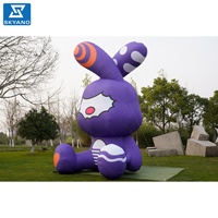 Modèle d'art gonflable personnalisé en forme de lapin violet pour la publicité d'événements en plein air, la décoration, la promotion de la marque et l'affichage