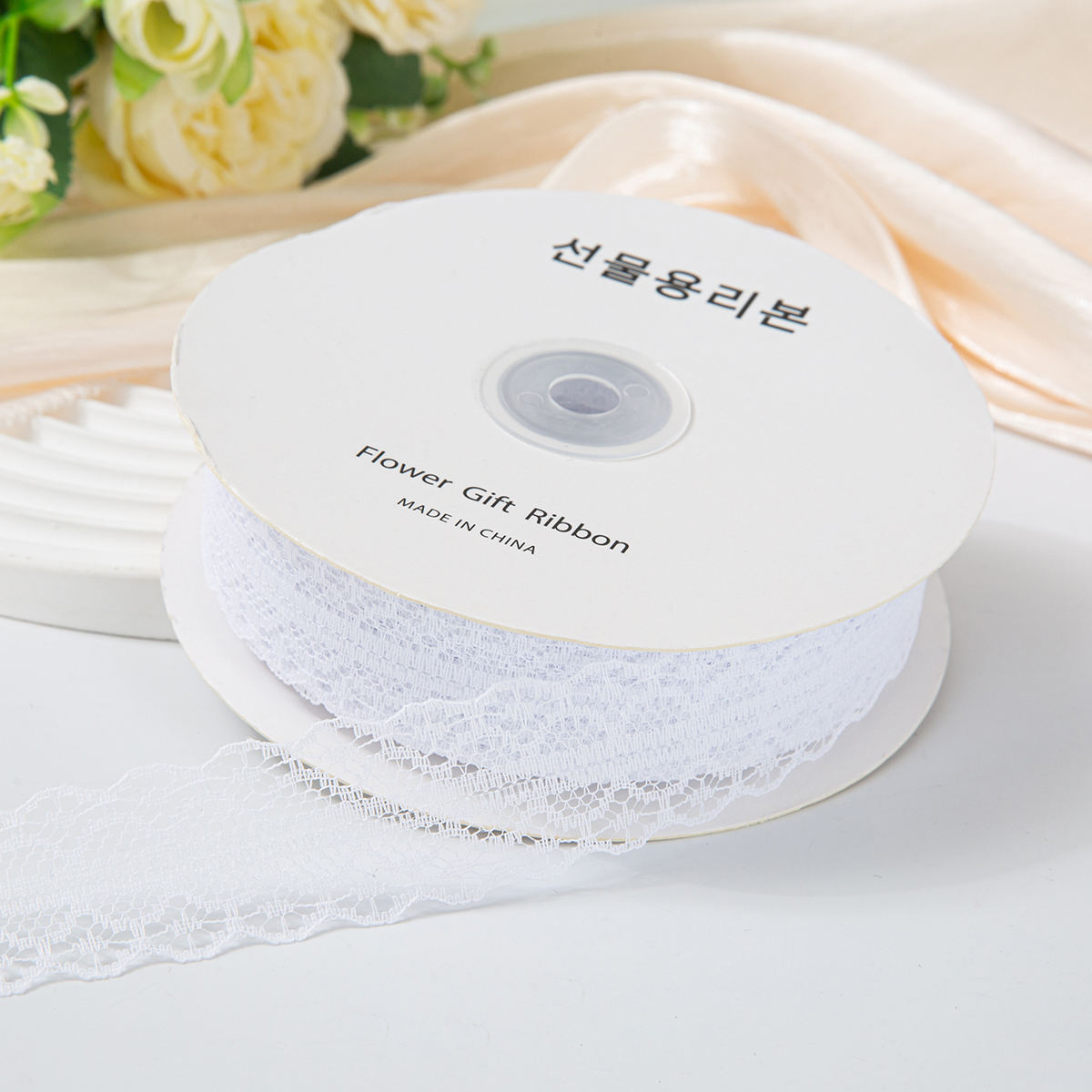 เข็มขัดลูกไม้สีขาว 3 ซม. 50 หลา ประมาณ 45 ม