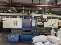 Machine de moulage par injection plastique ZHENHUA 128T pour la fabrication de plantes artificielles décoratives de jardin en plastique à deux couleurs