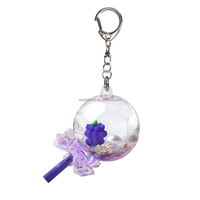 Porte-clés en plastique en forme de sucette rose et violet, rempli de liquide, avec flotteur en résine de baies et confettis scintillants à l'intérieur, idéal pour les cadeaux