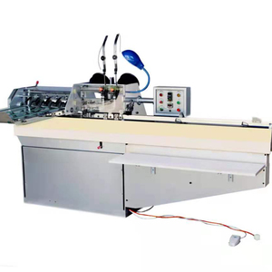 Machine automatique de reliure et de couture de livres - Product Image 1