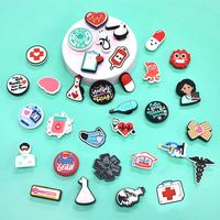 Promotion unisexe Pvc personnalisé dessin animé mignon infirmière médicale chaussure breloques en vrac appliques chaussures décoration