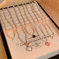 Nouveau collier coréen en perles édition limitée, polyvalent et élégant, chaîne de col en forme de cœur pour femme, accessoires de perles de qualité luxueuse, vente en gros