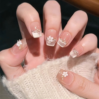 Faux ongles à presser faits main, style dessin animé français mignon, forme amande, dégradé transparent, avec motifs 3D (ours, étoile, nœud) et perles macaron, pour femmes, réutilisables au quotidien