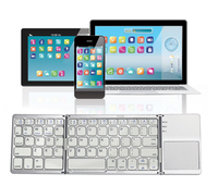 B089T Nouveau Mini Clavier Portable Pliable à Trois Volets 64 Touches Sans Fil avec Pavé Tactile Anglais pour Ordinateur Portable iOS Android iPad