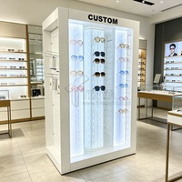 Vitrine rotative personnalisée pour lunettes de soleil à LED, présentoir de sol pour lunettes avec étagères amovibles et roulettes à frein pour magasin d'optique