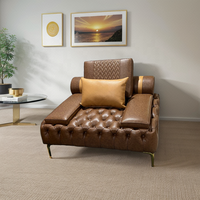 Fauteuil en cuir monoplace Chesterfield avec pieds en métal doré au design tufté pour canapés de salon