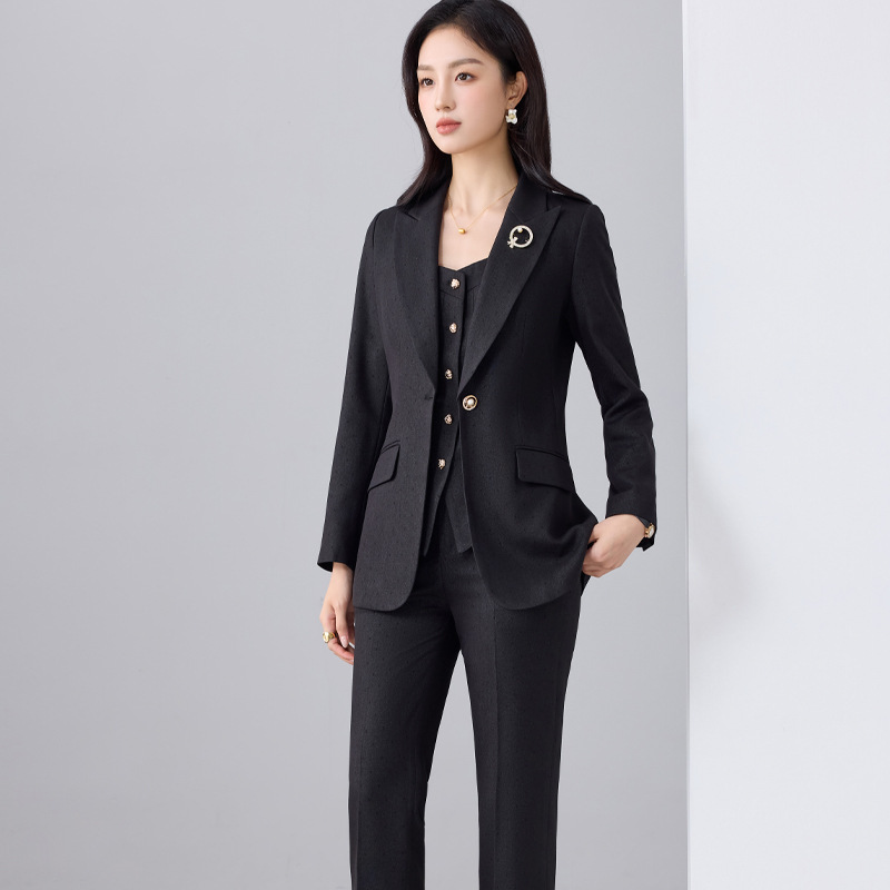 Black suit flared trousers brooch