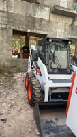   Chargeuse compacte d'occasion S185 S77 haute performance pour les entreprises de location