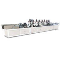 Type L et V, vitesse de 40m par minute, coupe servo, coins en carton pressé, machine avec trous de perçage