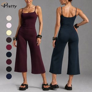 Conjunto de Top de Yoga de Tirantes Cruzados para Mujer con Logotipo Personalizado, de Secado Rápido para Correr y Fitness, y Leggings de Cintura Alta con Efecto Levanta Glúteos - Product Image 2