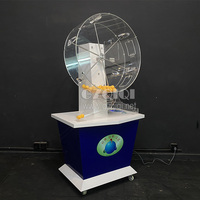 Machine de loterie par mécanisme pour jeux de loto avec six autocollants J80
