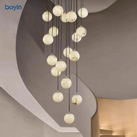 Lustre minimaliste postmoderne en albâtre, lampe suspendue sphérique artistique multi-lumières pour escalier, villa, salon