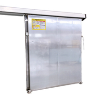 Porte coulissante manuelle pour chambre froide, idéale pour les centres de distribution alimentaire, avec accès latéral coulissant et isolation pour entrepôts frigorifiques industriels