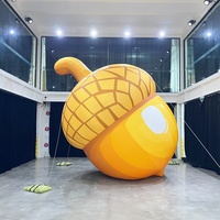 Décoration publicitaire gonflable géante personnalisée en forme de noix de dessin animé et de pomme de pin en tissu Oxford