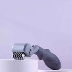 Peigne démêlant FURminator, outil de toilettage pour chats à poils longs et outil d'élimination des poils de chiens et de chats. - Product Image 1