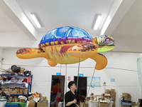 Publicité, grand ballon gonflable en forme de tortue de mer, marionnette, mascotte gonflable