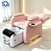 Fauteuil de pédicure électrique rose pour salon de beauté, avec fonction de massage, lumière LED et bac à bain de pieds